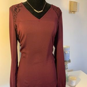 Maroon Blouse, 1/4 open back and clasped wrists.